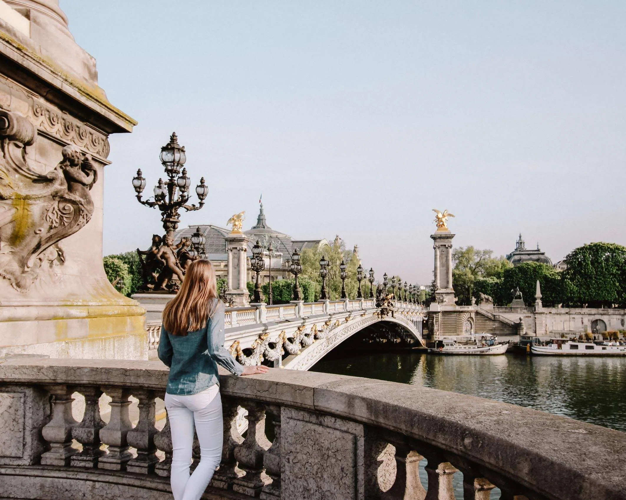 Picnic by the Seine as the sun sets behind Paris bridges